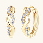Close-up of Luckinging huggie moissanite earrings with spiral design