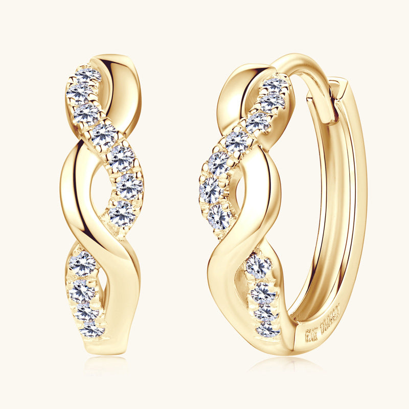 Close-up of Luckinging huggie moissanite earrings with spiral design