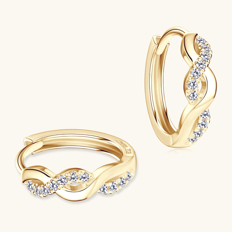 Spiral motif close-up on huggie style earring