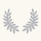 Side view of leaf moissanite earrings highlighting stone sparkle