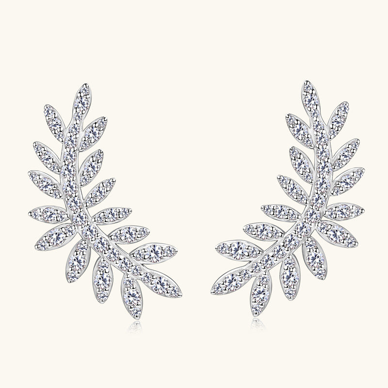 Side view of leaf moissanite earrings highlighting stone sparkle