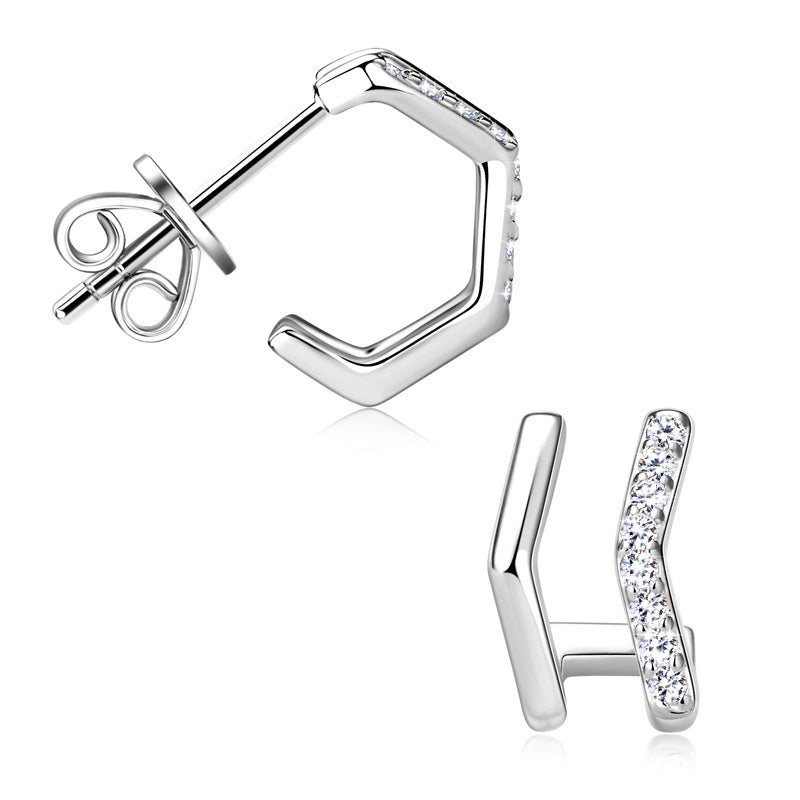 Lightweight gold huggie hoops designed for comfortable daily wear