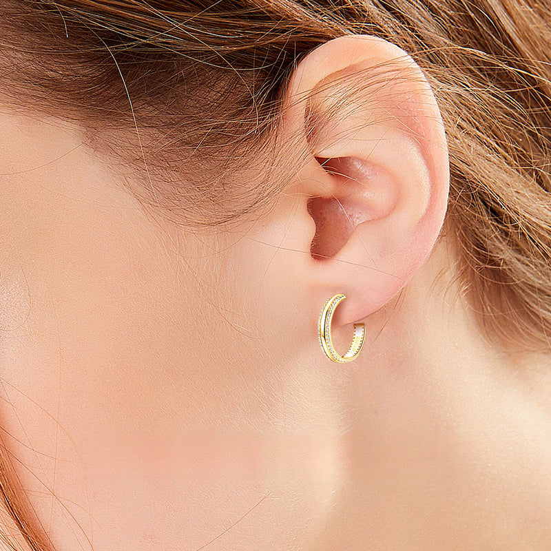 Luckinging dangle earrings on model, showcasing lightweight design