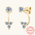 Luckinging C-shaped dangle earrings with moissanite on a model's ear
