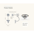 Luckinging C-shape dangle earrings worn casually in a natural setting