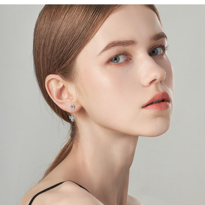 Front view of Luckinging C-shaped dangle earring in natural light