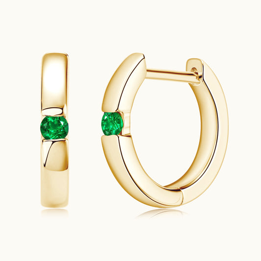 Close-up of Luckinging Sterling Silver Emerald Huggie Earrings showing front detail