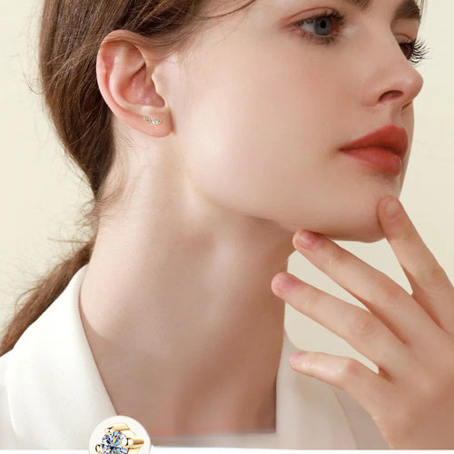 Close-up of 14K Gold Flower Earrings showing polish and detail