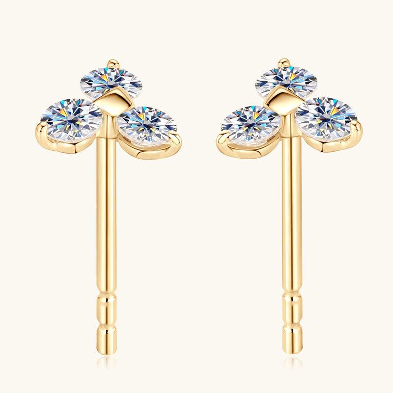 Focused view of moissanite stone in gold flower stud design