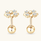 Earring highlighting leaf shape and gold finish