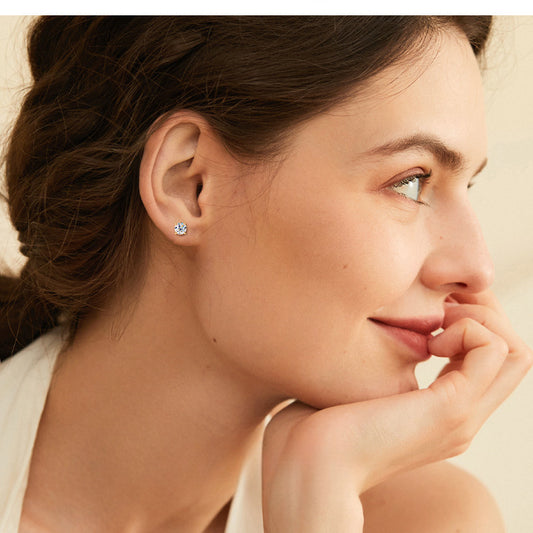Side view of Luckinging huggie hoop earrings showing moissanite stones and hinged closure detail