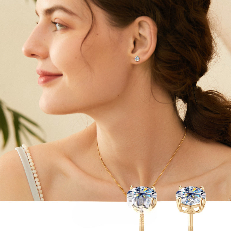 Elegant huggie earrings on model ear
