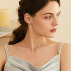 Flat back stud earrings in silver tone