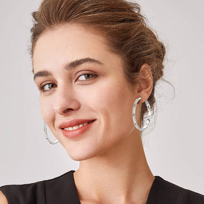 Woman wearing Luckinging moissanite drop earrings lifestyle photography shot