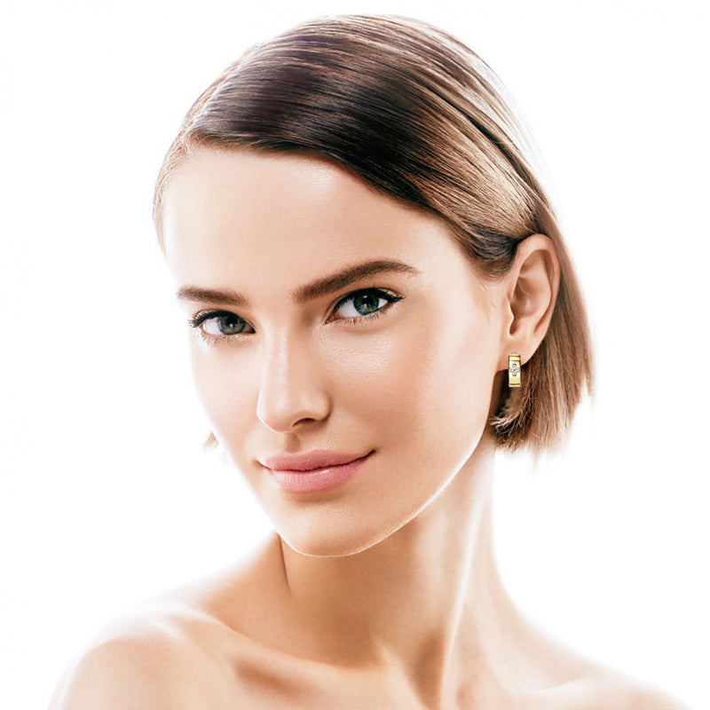 Woman wearing Luckinging gold huggie hoop earrings lifestyle photography