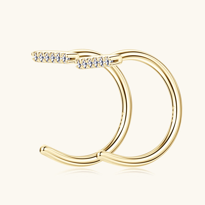 Minimalist gold jewelry collection featuring stud earrings