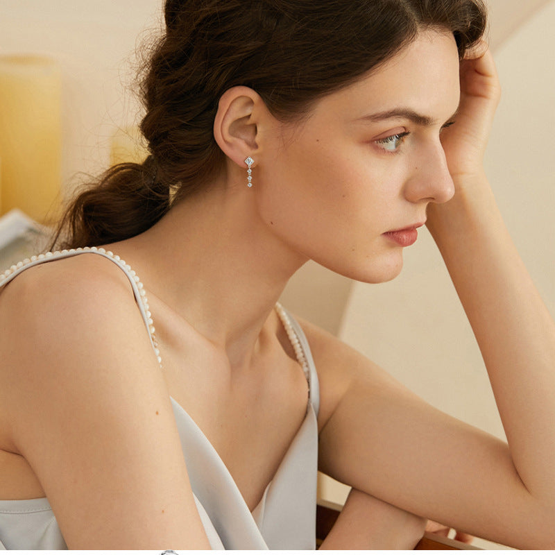 Display of Luckinging Moissanite earrings as a pair
