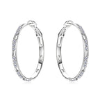 Minimalist silver earring with sparkling stone