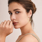 Simple silver earring with round moissanite