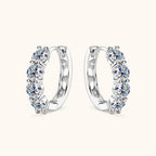 Close-up of Luckinging Moissanite Huggie Earrings showing sparkle