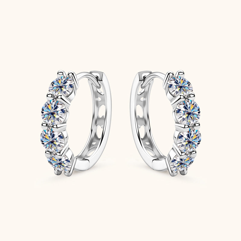 Close-up of Luckinging Moissanite Huggie Earrings showing sparkle