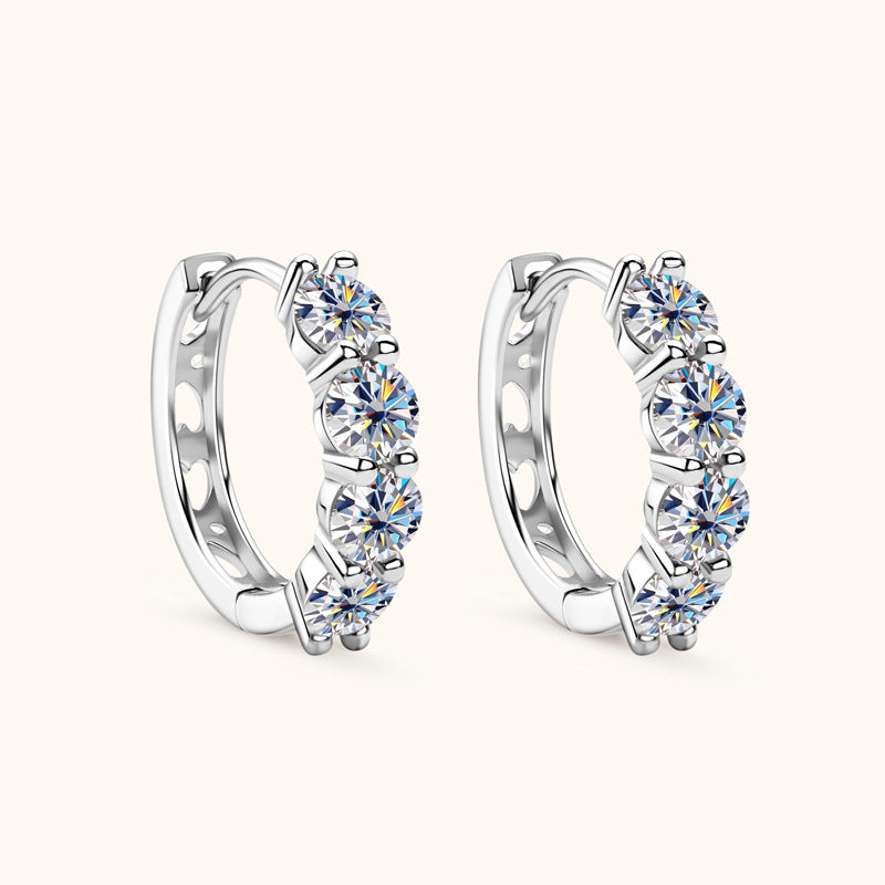 Side view of Luckinging Moissanite Huggie Earrings on model ear