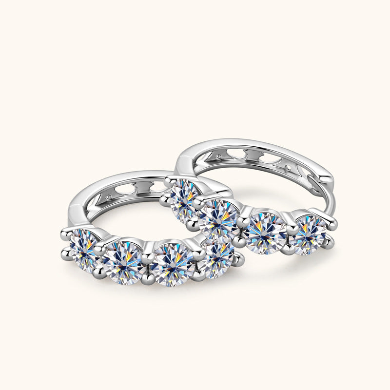 Detail of Moissanite stone in Luckinging Huggie Earrings