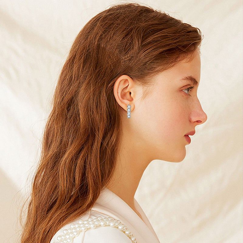 Front and side angle of Luckinging Moissanite Huggie Earrings