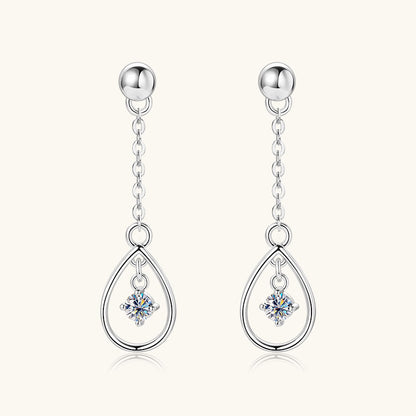 Silver dangle earrings side angle showcasing teardrop silhouette