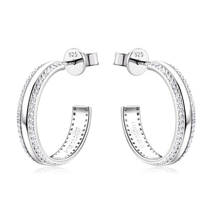 Silver drop earrings worn by model lifestyle image