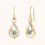 Sterling silver teardrop dangle earring with moissanite stone close up
