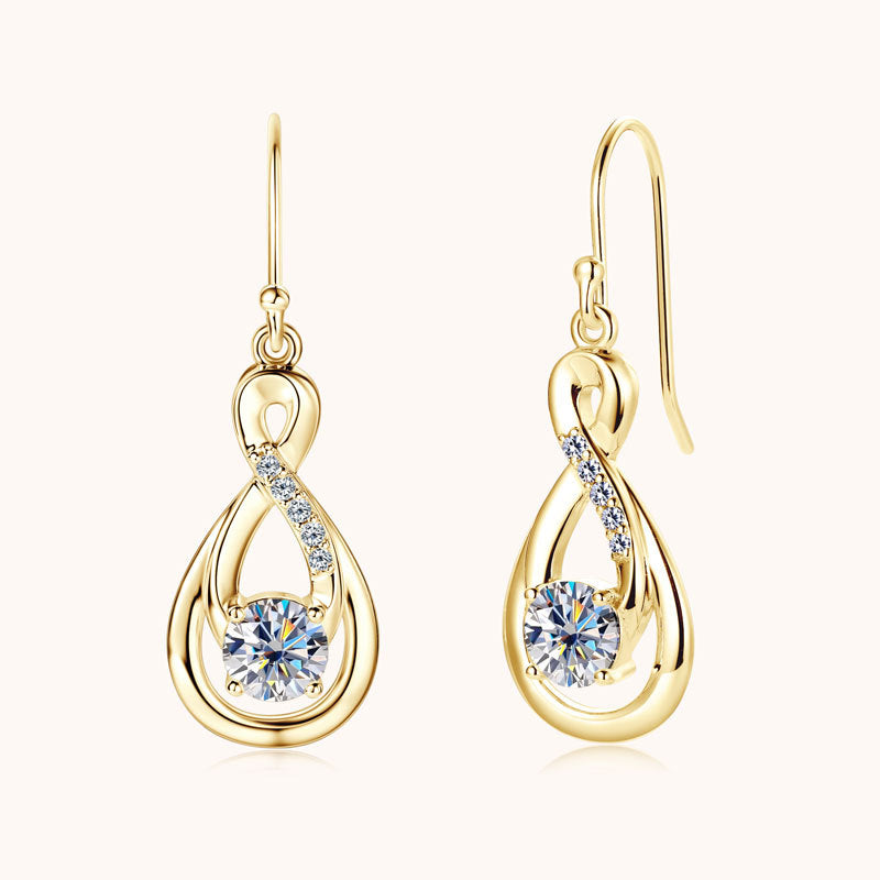 Sterling silver teardrop dangle earring with moissanite stone close up