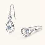 Elegant silver water drop earring with sparkling center stone