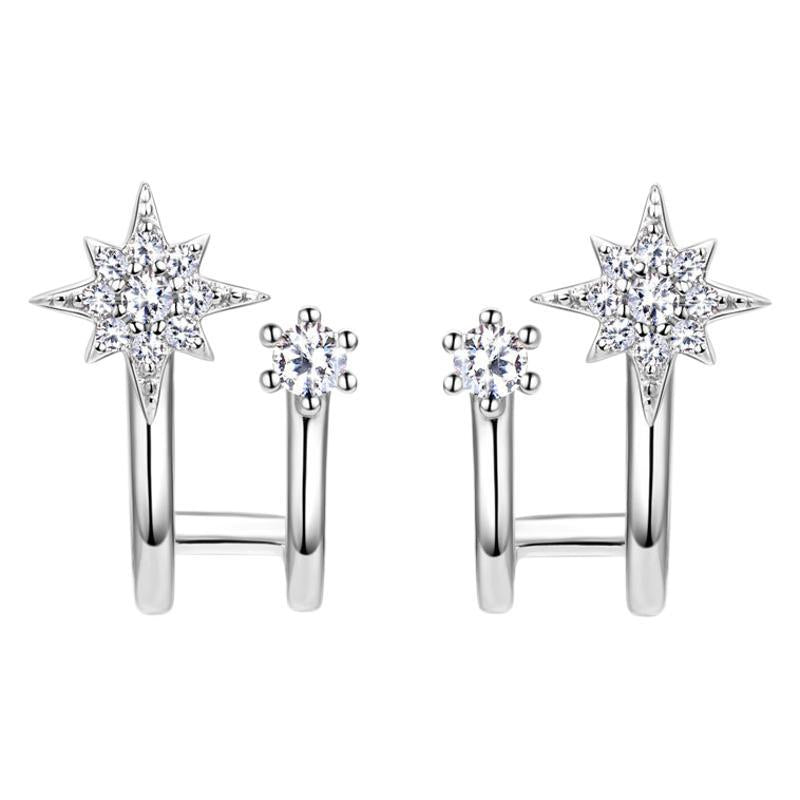 Elegant luckinging star stud earrings on a white background