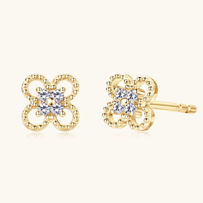 10K Gold star stud earrings with moissanite stones close up