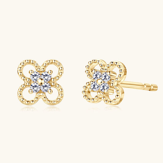 10K Gold star stud earrings with moissanite stones close up