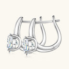 Detailed close up view of sterling silver huggie earring craftsmanship