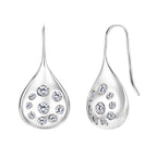Shimmering effect of the teardrop gemstones under soft lighting