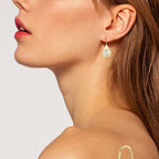 Image showing the earrings hanging naturally to display movement and drape