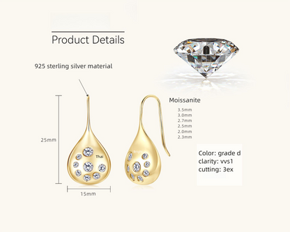 Product flatlay teardrop earrings styling shot