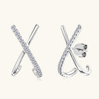 Close-up of Luckinging X-shaped moissanite stud earrings showing silver and stone detail