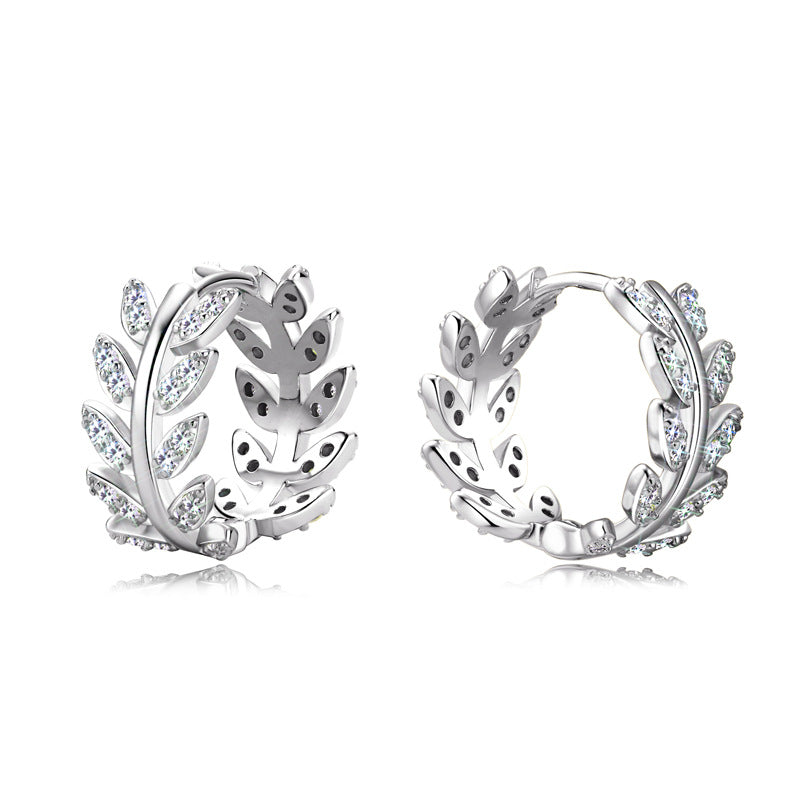 Minimalist leaf stud earrings with sparkling stones