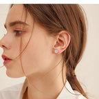 Angle shot highlighting the round cluster of Luckinking Moissanite Earrings