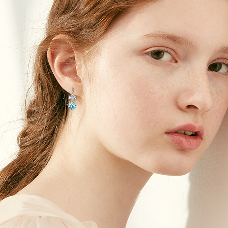Full image of the paired Mermaid Blue Moissanite Teardrop Earrings