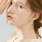 Detailed shot of the teardrop Moissanite gem from multiple angles