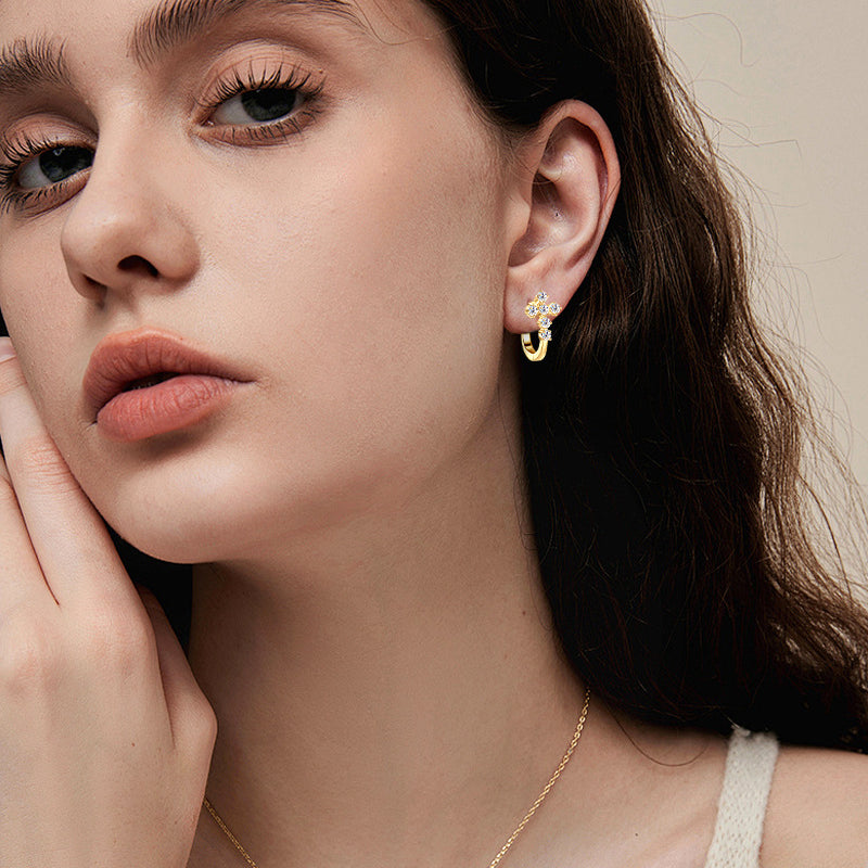 Multiple angle view of minimalist huggie earrings displaying versatility and refined aesthetics