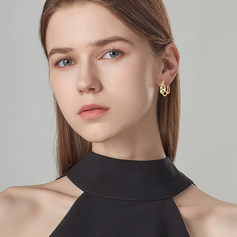 Collection view of minimalist flat back moissanite stud earrings showing elegant simple design aesthetic