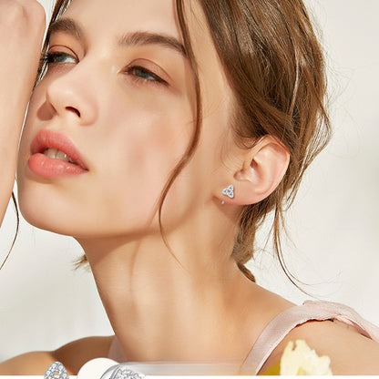 Side view of minimalist flat back moissanite geometric stud earrings showing C shape design