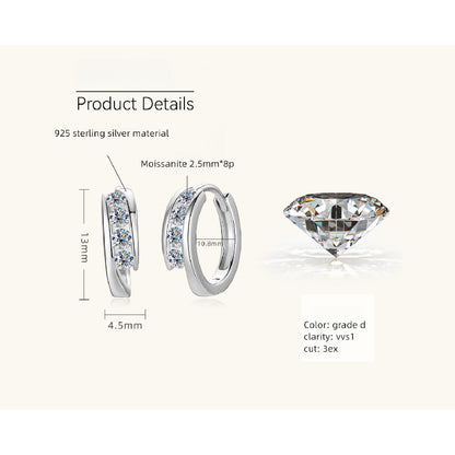 Size comparison of moissanite flat back studs next to coin showing 6mm diameter