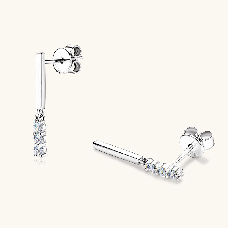 Close up detail of moissanite stone setting in premium 925 sterling silver huggie hoop earrings